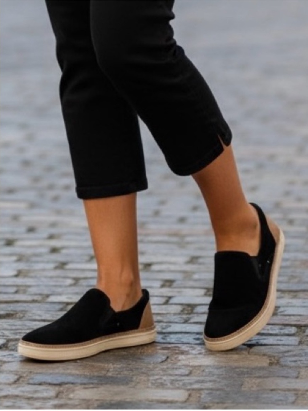 UGG Women’s Adley Perf Black Suede Slip-On with Tan Heel Accent